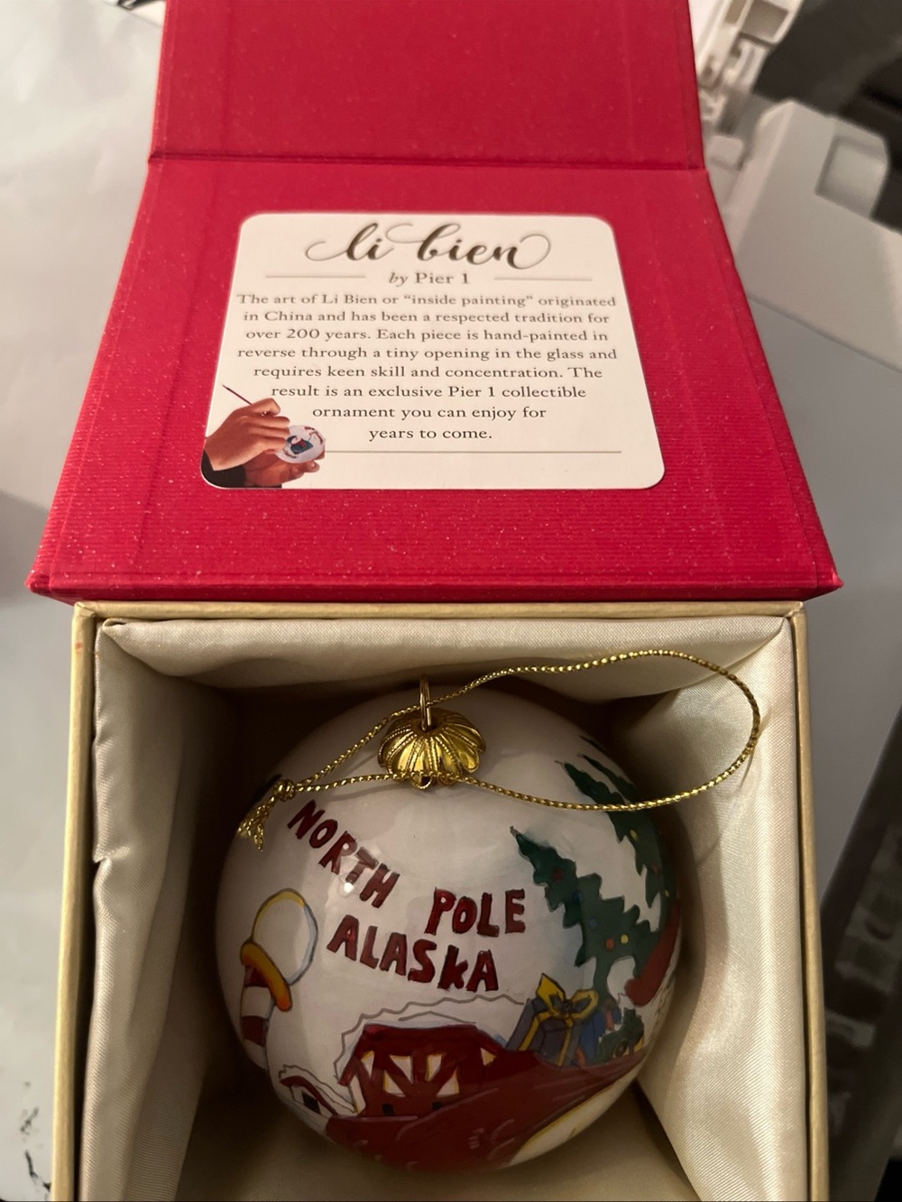 Pier 1 Li Bien White Glass North Pole Alaska Ornament with Red and Green Accents